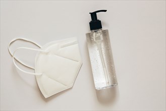 Studio shot of face mask and hand sanitizer