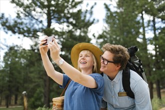 USA, Utah, Bryce Canyon, Couple taking selfie in national park