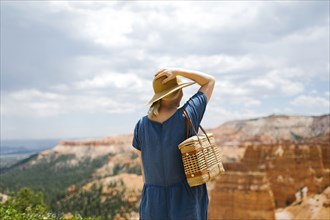 USA, Utah, Bryce Canyon, Woman in hat looking at canyon