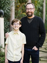 USA, California, Orange County, Portrait of father and son (14-15)