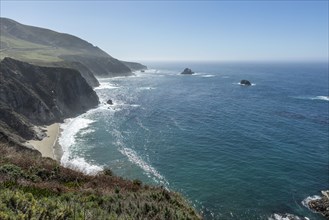 USA, California, Big Sur, Seascape with cliffs and beach on sunny day