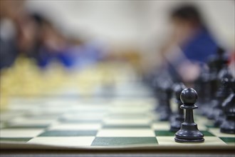 Close up of chess board with chess pawns