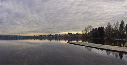 USA, Washington, Seattle, Pier at lake at sunset