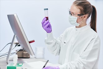 Female technician working in laboratory