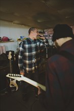 Young men during rehearsal in garage