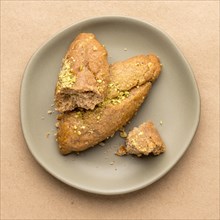 Greek honey and pistachio cookies on plate