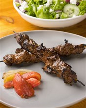 Steak kabob and Greek salad