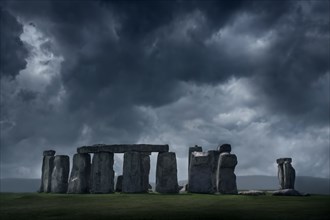 United Kingdom, England, Storm clouds above Stonehenge