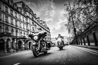 United Kingdom, London, Motorcyclists on city street