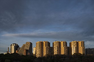 Spain, Valencia, Apartment buildings under cloudy sky