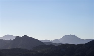 Spain, Ronda, Sierra de Grazalema under blue sky