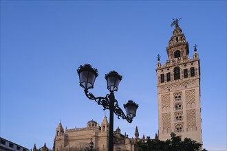 Spain, Seville, High section of Giralda Tower and Seville cathedral