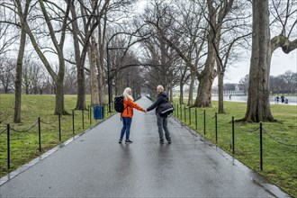 USA, Washington D.C., Senior couple posing for photo in park