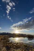 USA, Idaho, Sun Valley, Sunrise reflected in water
