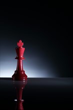 Studio shot of red chess king