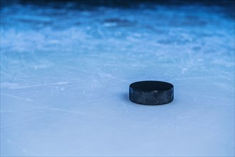 Hockey puck on ice