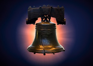 Liberty bell against blue,,