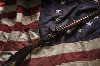 Rifle lying on American flag