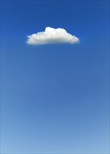 Single cloud in blue sky,,