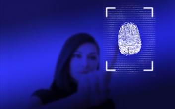 Woman leaving her fingerprint on screen