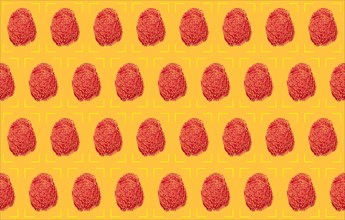 Red fingerprints on yellow background