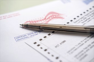 Voting ballot and pen