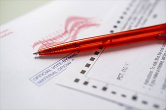 Voting ballot and red pen