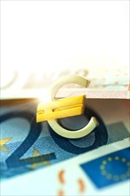 Euro symbol and euro bills