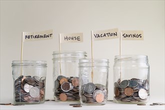 Jars with money saved for various purposes