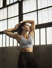Portrait of woman wearing sports bra