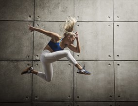 Sporty woman jumping