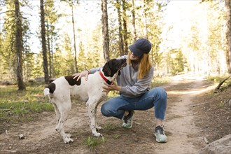 Woman with her dog in Uinta-Wasatch-Cache National Forest