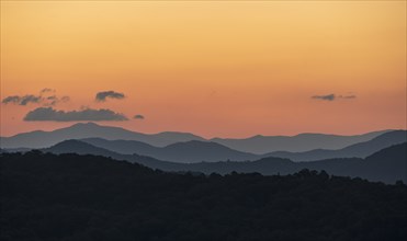 USA, Georgia, Orange sky above Blue Ridge Mountains at sunrise