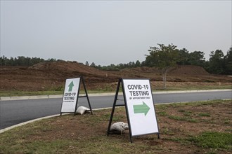USA, Georgia, Covid-19 testing signs on roadside