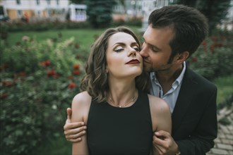 Ukraine, Couple embracing in garden