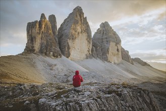 Italy, South Tirol, Sexten Dolomites, Tre Cime di Lavaredo, Man looking at rock formations