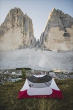 Italy, South Tirol, Sexten Dolomites, Tre Cime di Lavaredo, Tent in front of rock formations