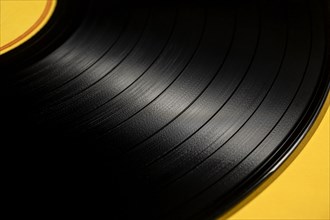 Vintage record on yellow background