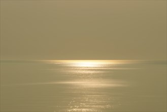 Calm sea and sky with sunlight