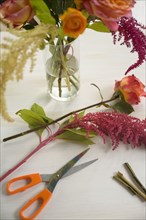 Floral arrangement and scissors