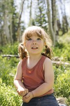 USA, Utah, Uinta National Park, Portrait of girl (2-3) in forest