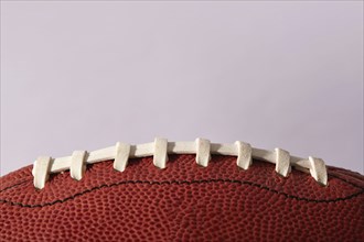 Close-up of football ball laces