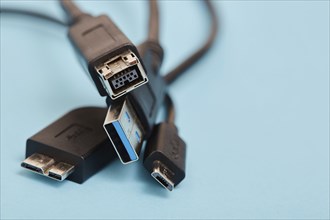 USB cables on blue background