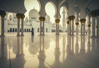 Woman photographing Sheikh Zayed Grand Mosque