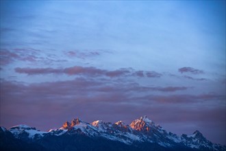 Sunset light on peaks of Teton Range in Grand Teton National Park