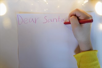 Hand writing letter to Santa Claus