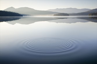 Ripples on calm lake surface