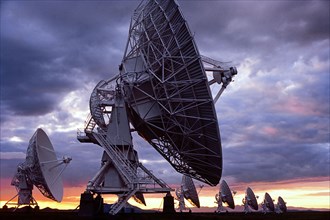 Radio telescopes at Karl G. Jansky Very Large Array at sunset