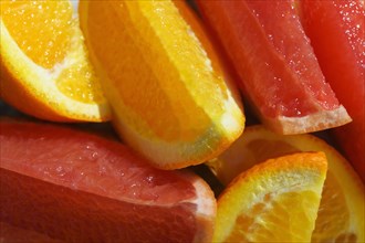 Close-up of sliced orange and grapefruit