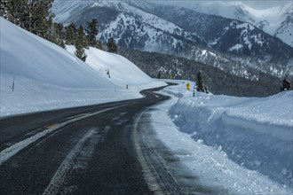 Road through snowy mountains